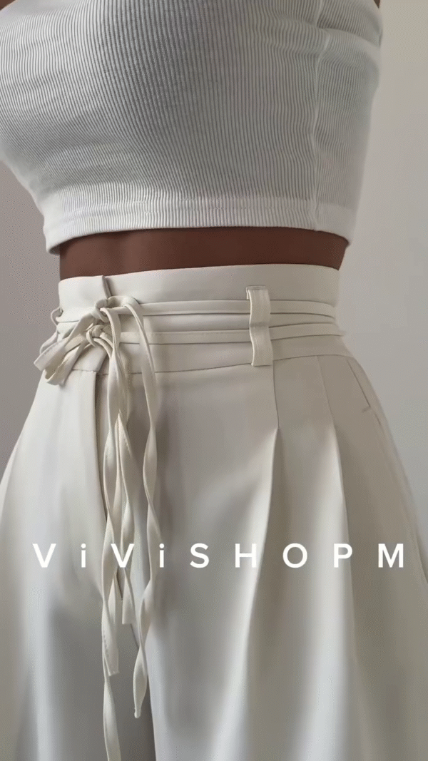 High-Waist Stone Beige Tailored Palazzo Pants with Waist-Cinch Belt Detailing – Elegant Pleated Wide-Leg Trousers for Modern Minimalist Fashion