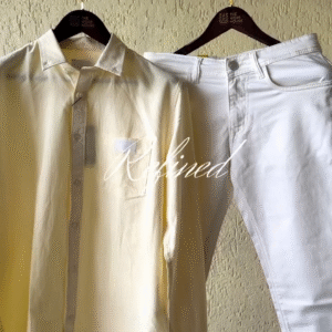 Refined Pastel Yellow Striped Shirt with Classic White Slim-Fit Jeans – Smart Casual Outfit