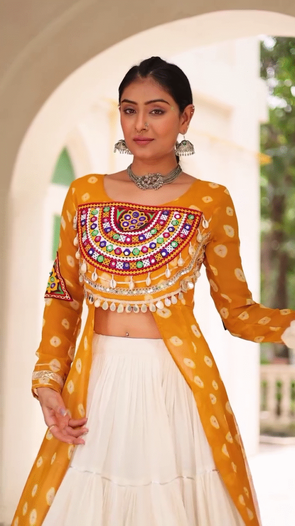 Traditional Kutchi Mirror Work Embroidered Pink Long Jacket with White Flared Lehenga – Navratri & Festive Special Ethnic Wear Set for Women