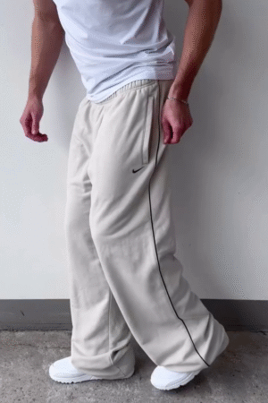 Off‑White Relaxed Wide‑Leg Track Pants with Elastic Waist and Black Side Piping for Athleisure & Lounge Wear” 🤍