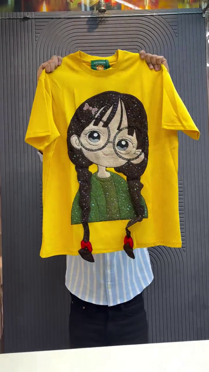 Trendy Yellow Oversized Graphic Cartoon Character Applique T-Shirt with Textured Braided Detail
