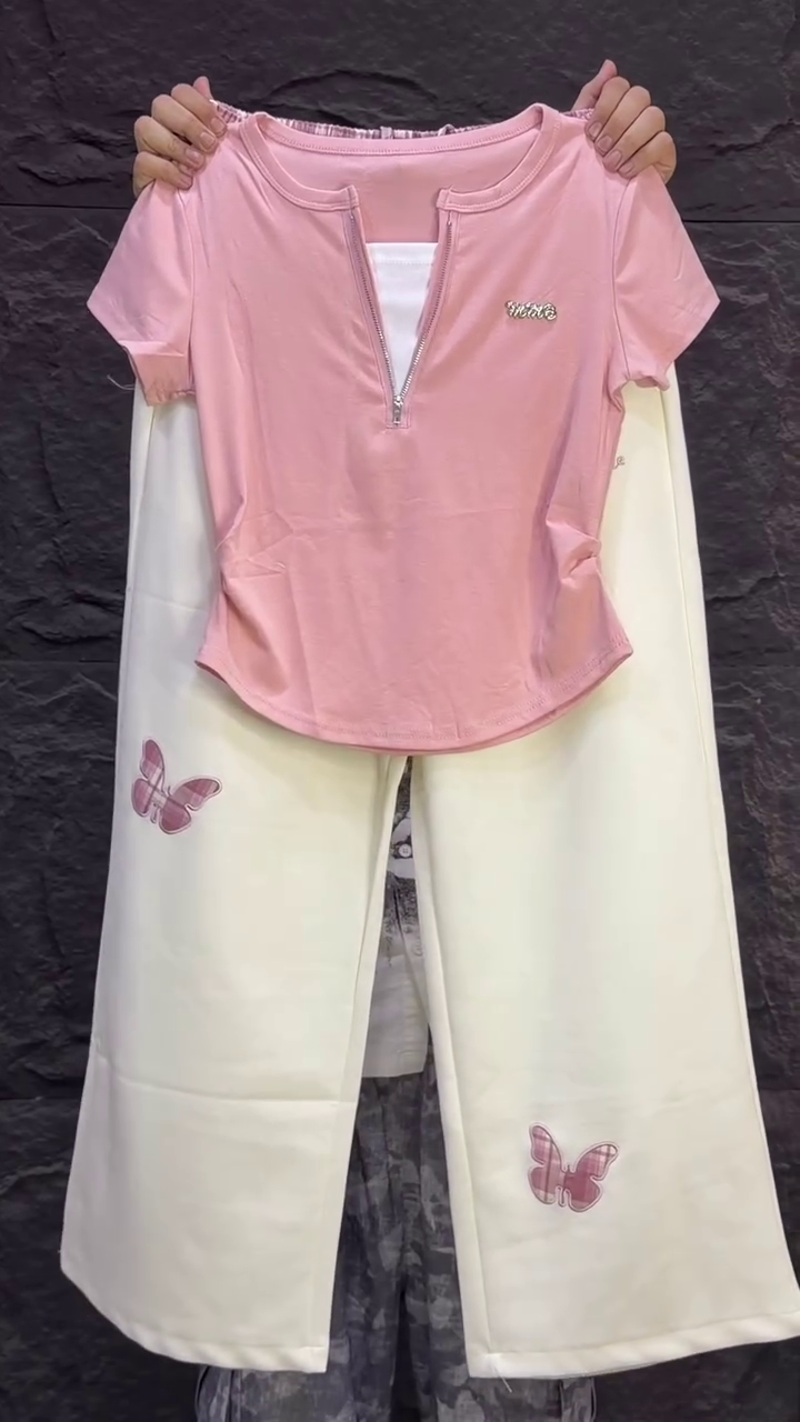 Pink Short-Sleeve Zip-Front Top with White Layering Effect and Matching Off-White Butterfly-Applique Trousers 🩷🦋