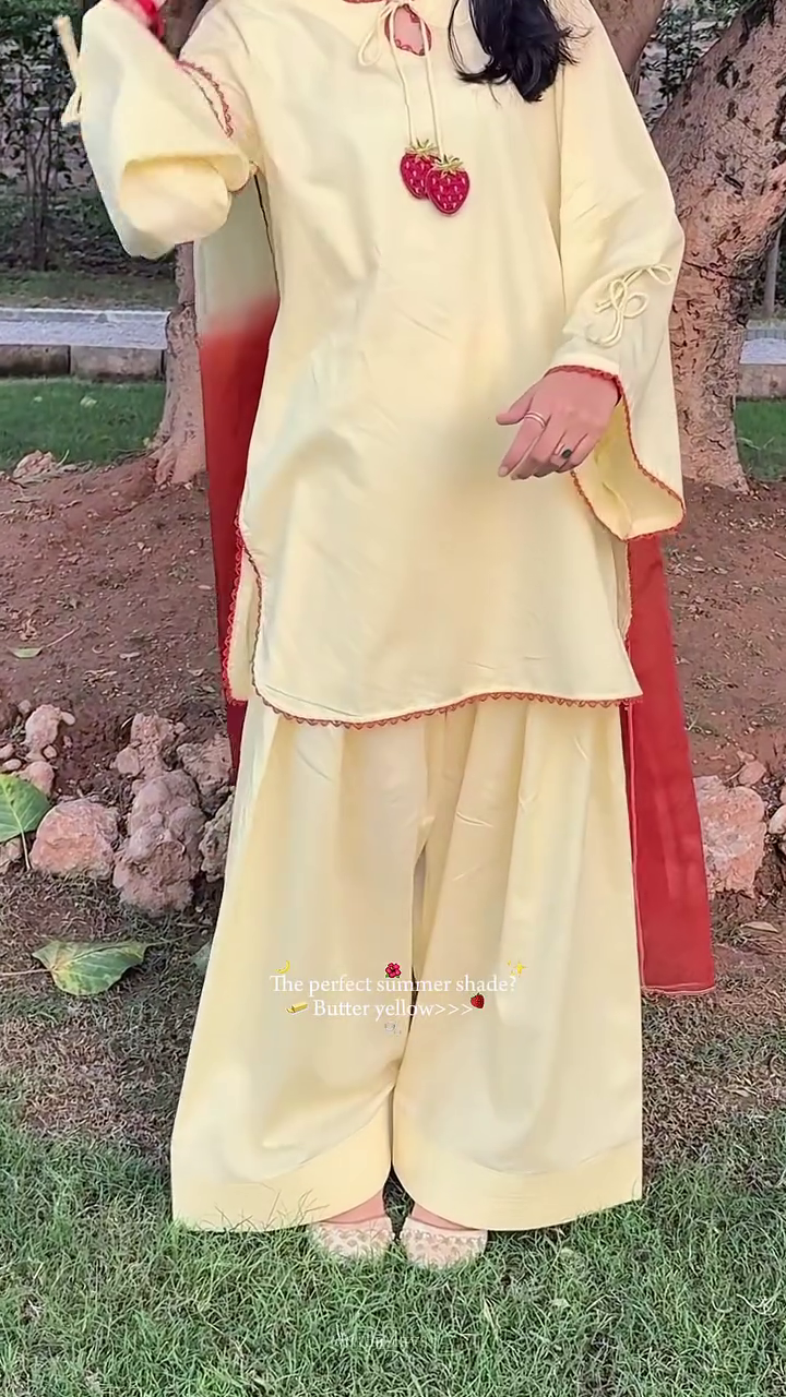Elegant Butter Yellow Cotton Ethnic Suit Set Featuring Tie-Up Neckline with Strawberry Tassels and Matching Wide-Leg Palazzos 🍓 - Image 2